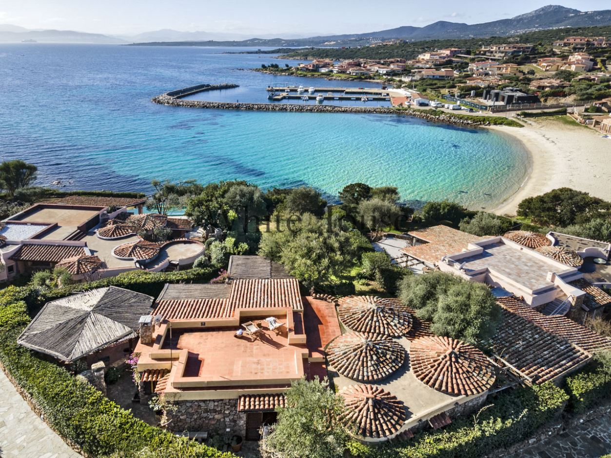 drone view of the villa and Baia Caddinas beach